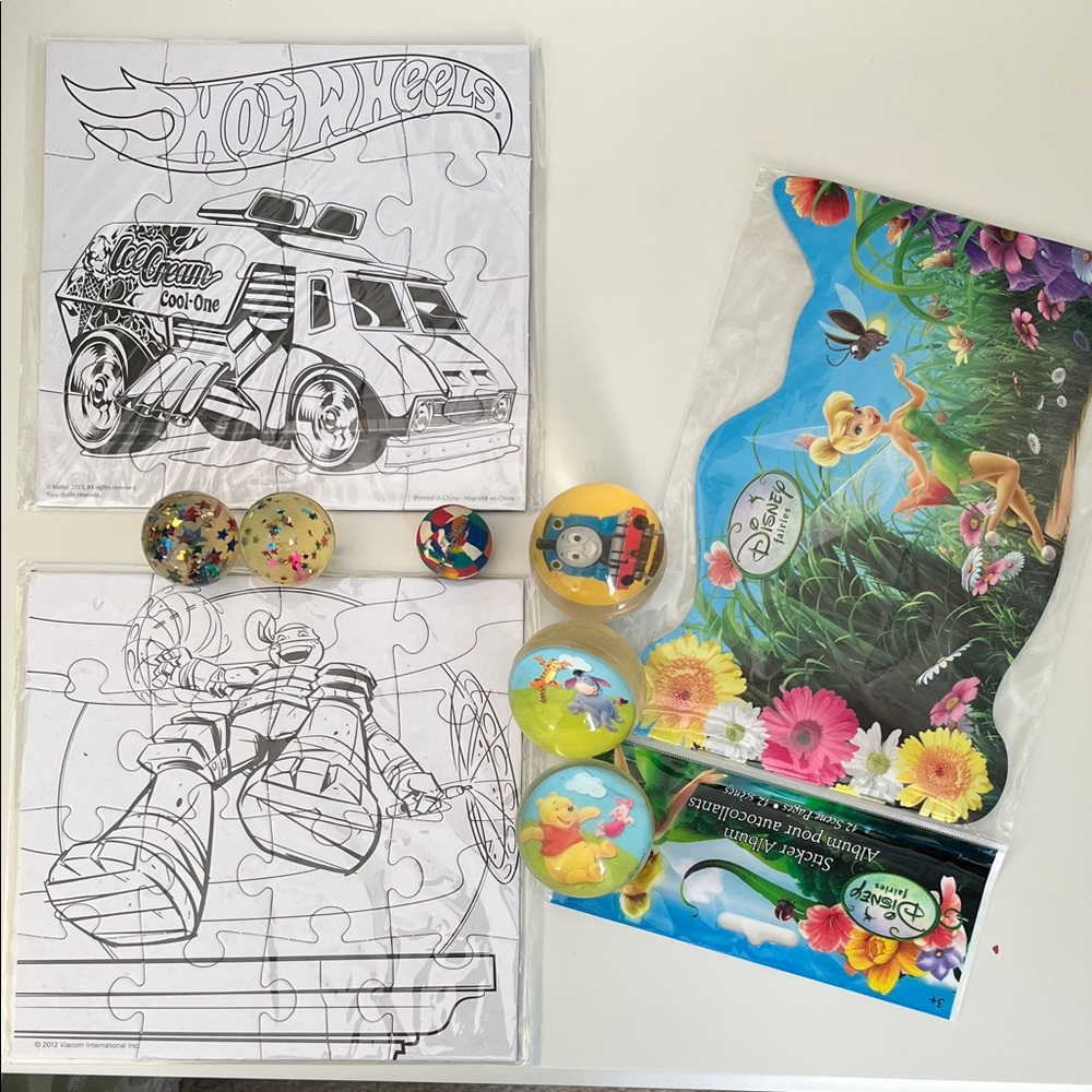 Loot bag stuff! Puzzles, sticker book and bouncy balls